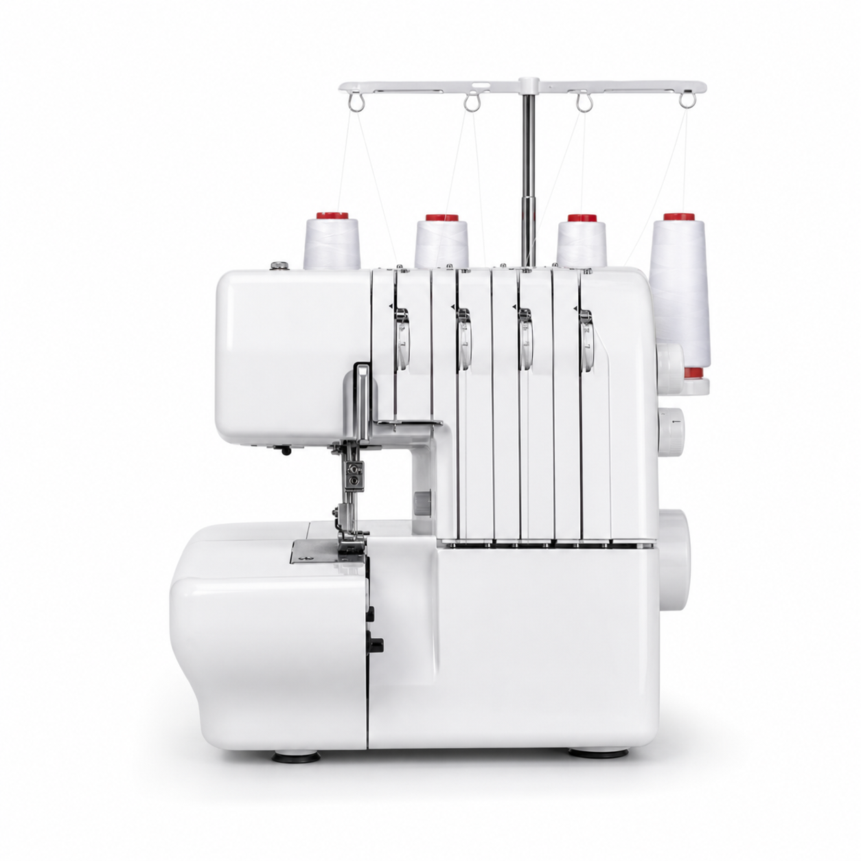 Máquina overlock blanca con conos de hilo
